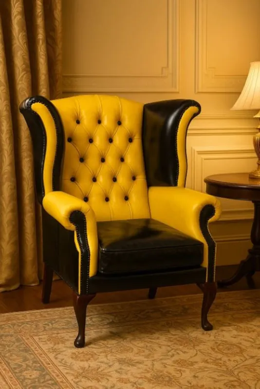 Casa Padrino Luxus Chesterfield Leder Ohrensessel Gelb / Schwarz / Braun H. 110 cm Expressversand