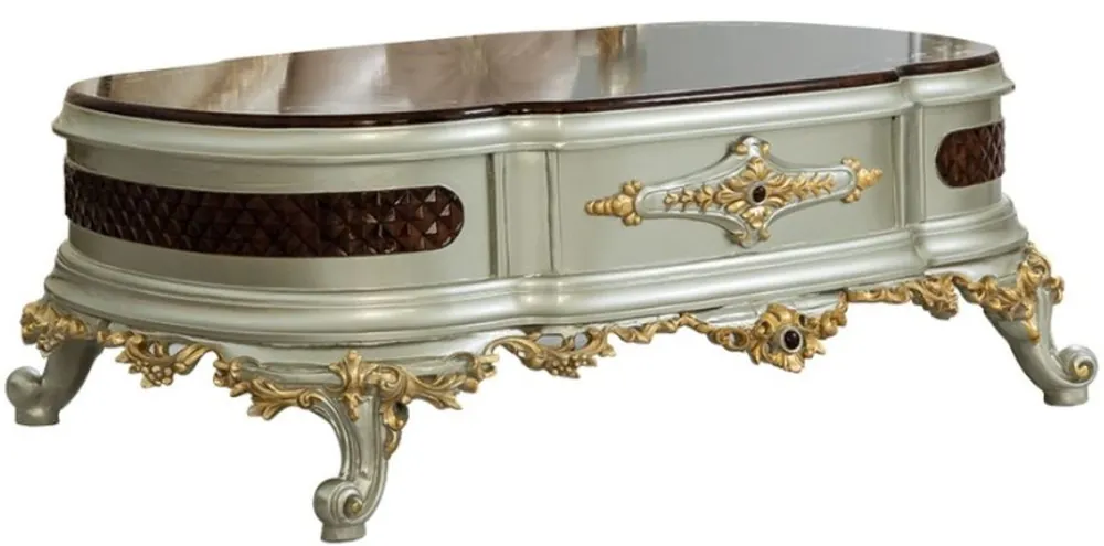 Heißes Angebot Casa Padrino luxury baroque coffee table dark brown / silver / gold 132 x 95 x H. 50 cm - Magnificent solid wood living room table - Baroque Furniture