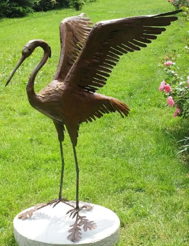 Top-Seller Casa Padrino sculpture de décoration de jardin héron oiseau rouille 70 x 105 x H. 110 cm - Élégante figure de décoration de jardin - Figurine de jardin résistante aux intempéries