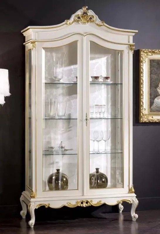 Bestseller Casa Padrino armoire vitrine baroque de luxe blanc / or - Vitrine fait main en bois massif avec 2 portes vitrées - Magnifique meuble baroque - Qualité de Luxe - Fabriqué en Italie