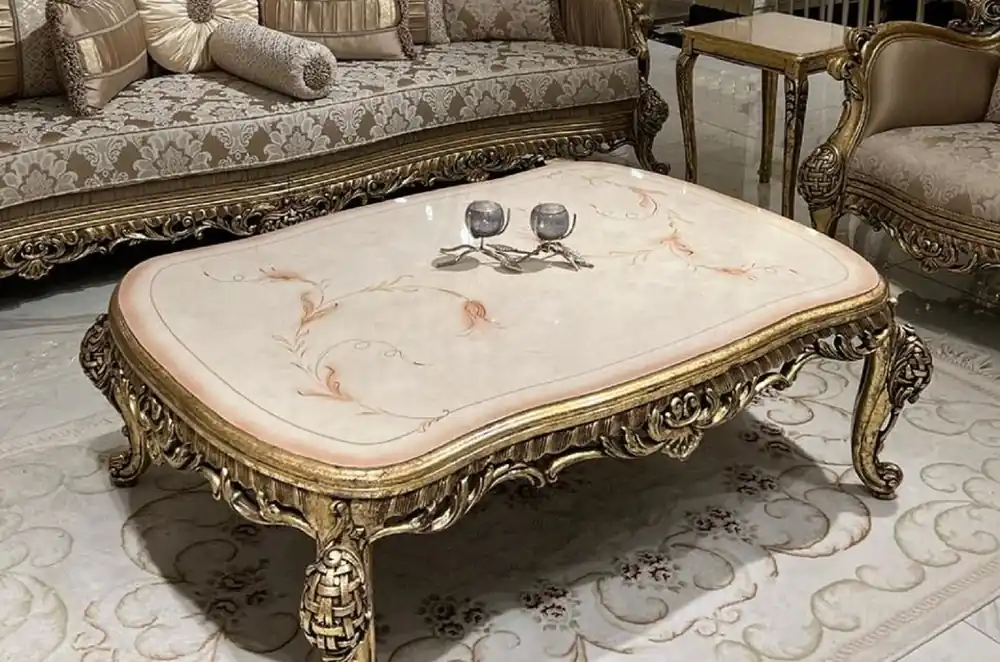 Direktkauf Casa Padrino table basse baroque de luxe crème / beige / or - Table de salon fabriquée à la main en bois massif de style baroque - Magnifique mobilier de salon baroque